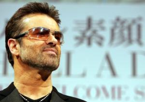 British singer George Michael poses for photo session prior to a press conference to promote his documentary film "George Michael, A different story," at a hotel in Tokyo, Thursday, Dec 15, 2005. The film, portraying his life in both bright and dark sides, will be released Dec 23. (AP Photo/Junji Kurokawa)